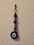 Large evil eye beaded amulet