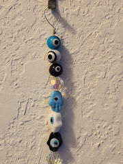 Hamsa evil eyes amulet