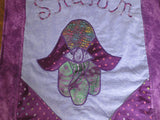 Shalom Hamsa evil eye all purples quilted wall hanging