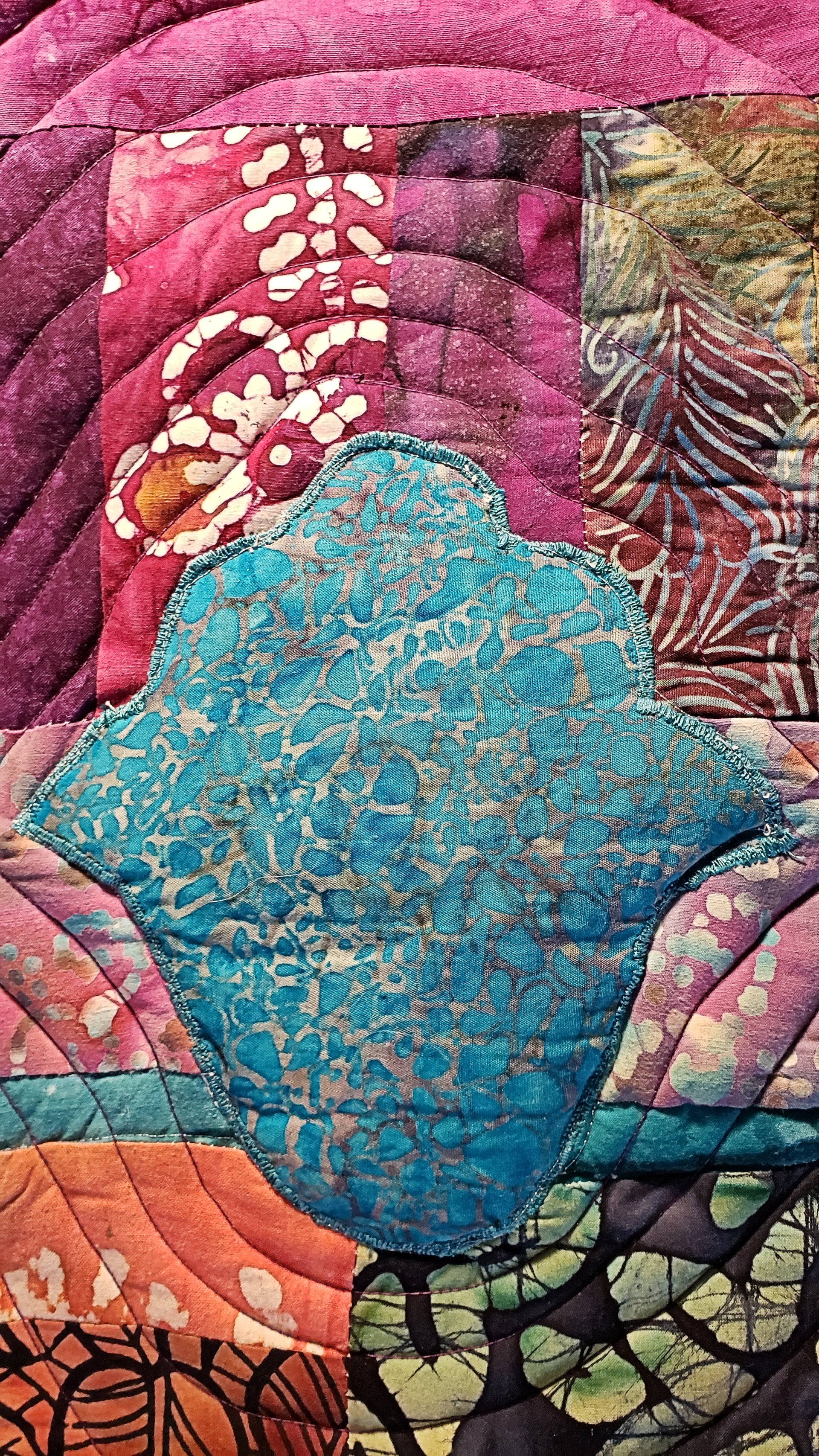 turquoise hamsa ripples in all batik trapunto wall hanging