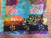 turquoise hamsa ripples in all batik trapunto wall hanging