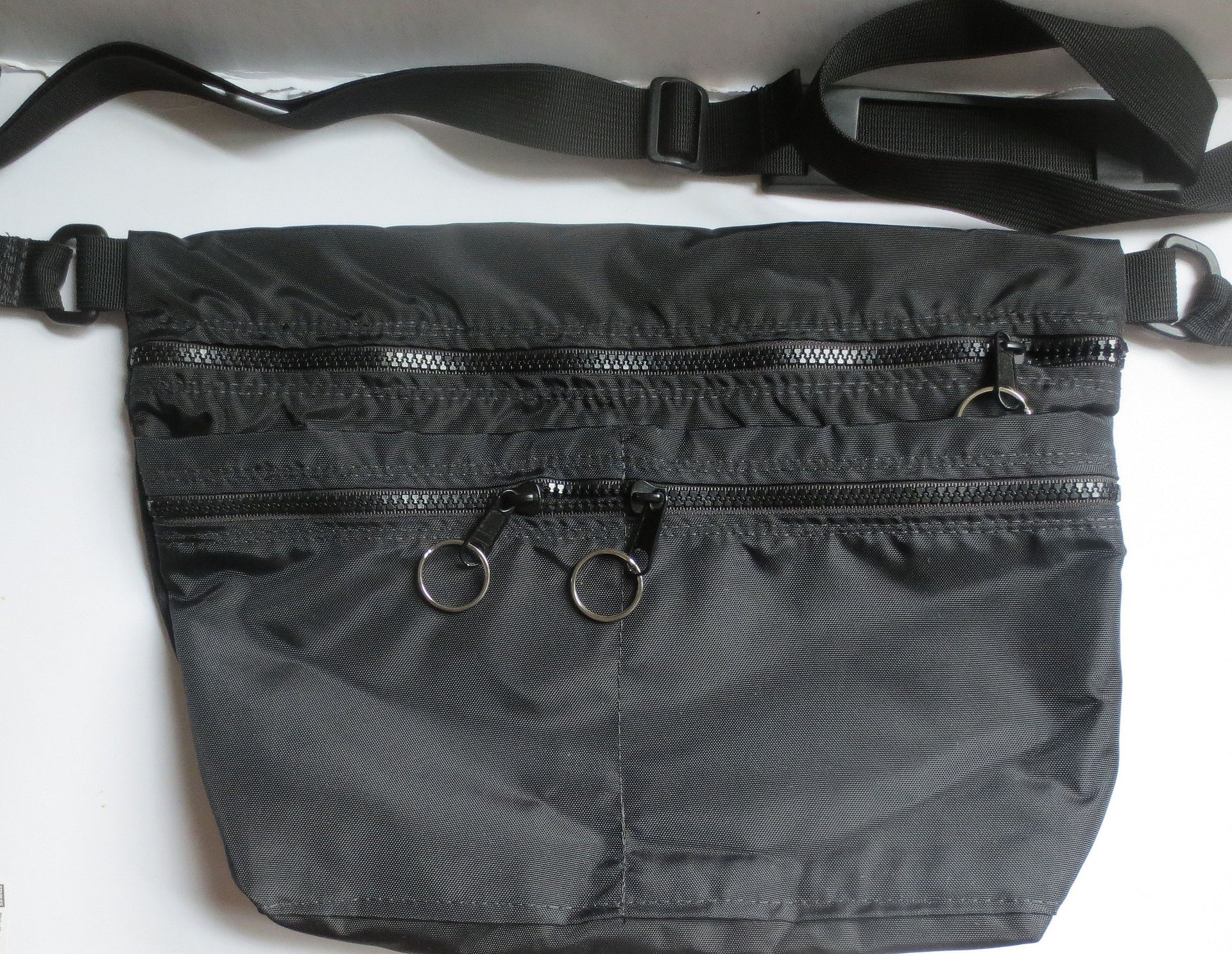 sling to waist packs --- great as a purse/pocketbook, awesome for travel and on the go!