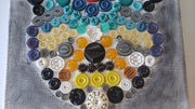 hamsa multicolored button art work with vintage buttons on canvas hand of miriam