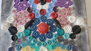 hamsa multicolored button art work with vintage buttons on canvas hand of miriam