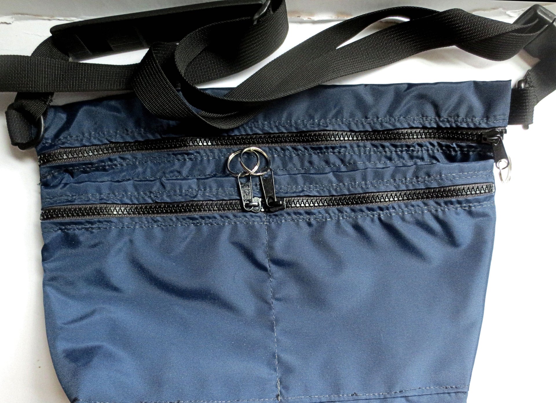 sling to waist packs --- great as a purse/pocketbook, awesome for travel and on the go!
