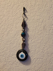 Large evil eye beaded amulet