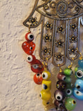 Variety of Evil Eye beaded Hamsa wall hangings