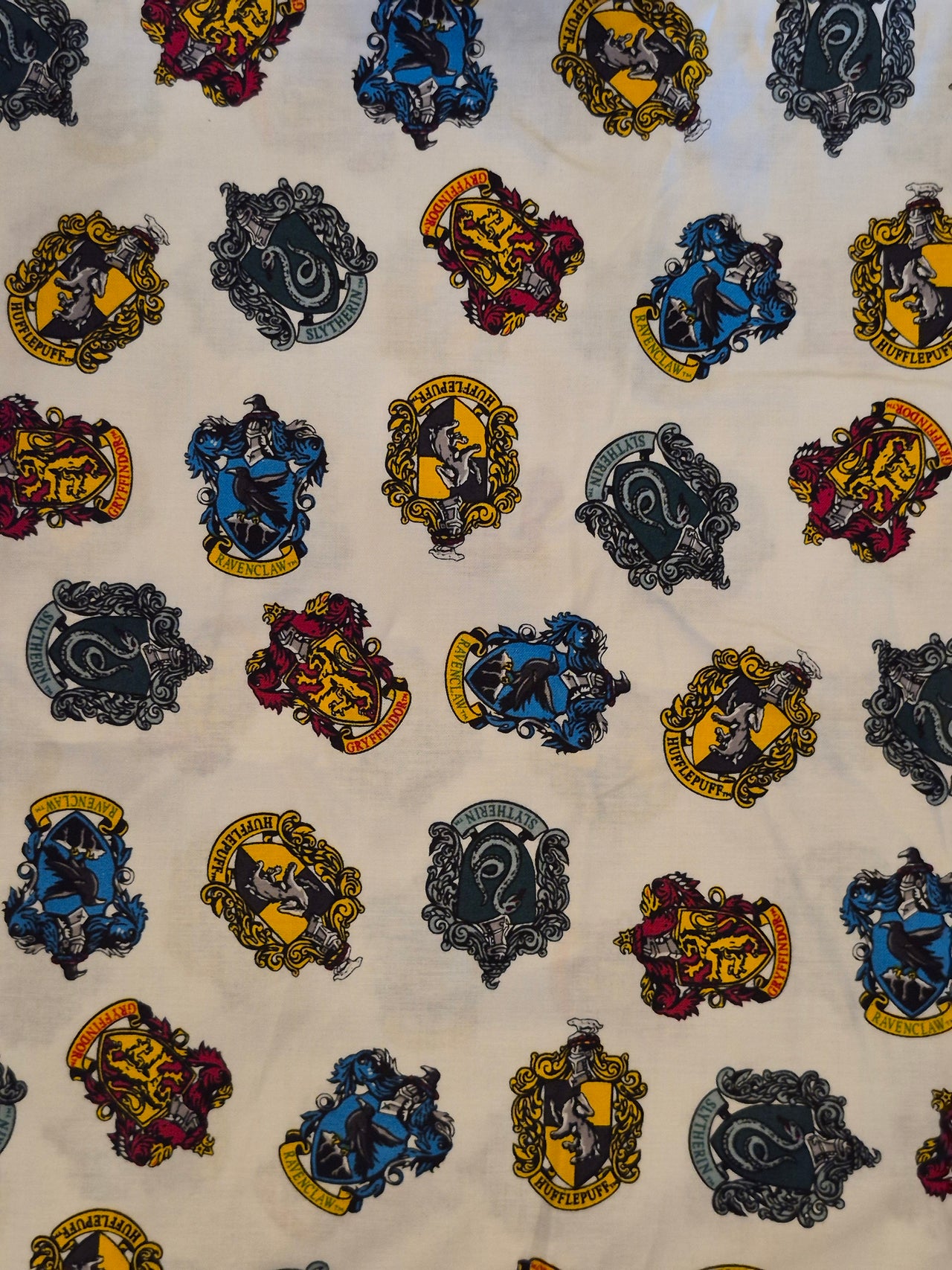 Harry Potter Hogwarts houses symbols logos cotton sew quilt fabric BHY x 44" w