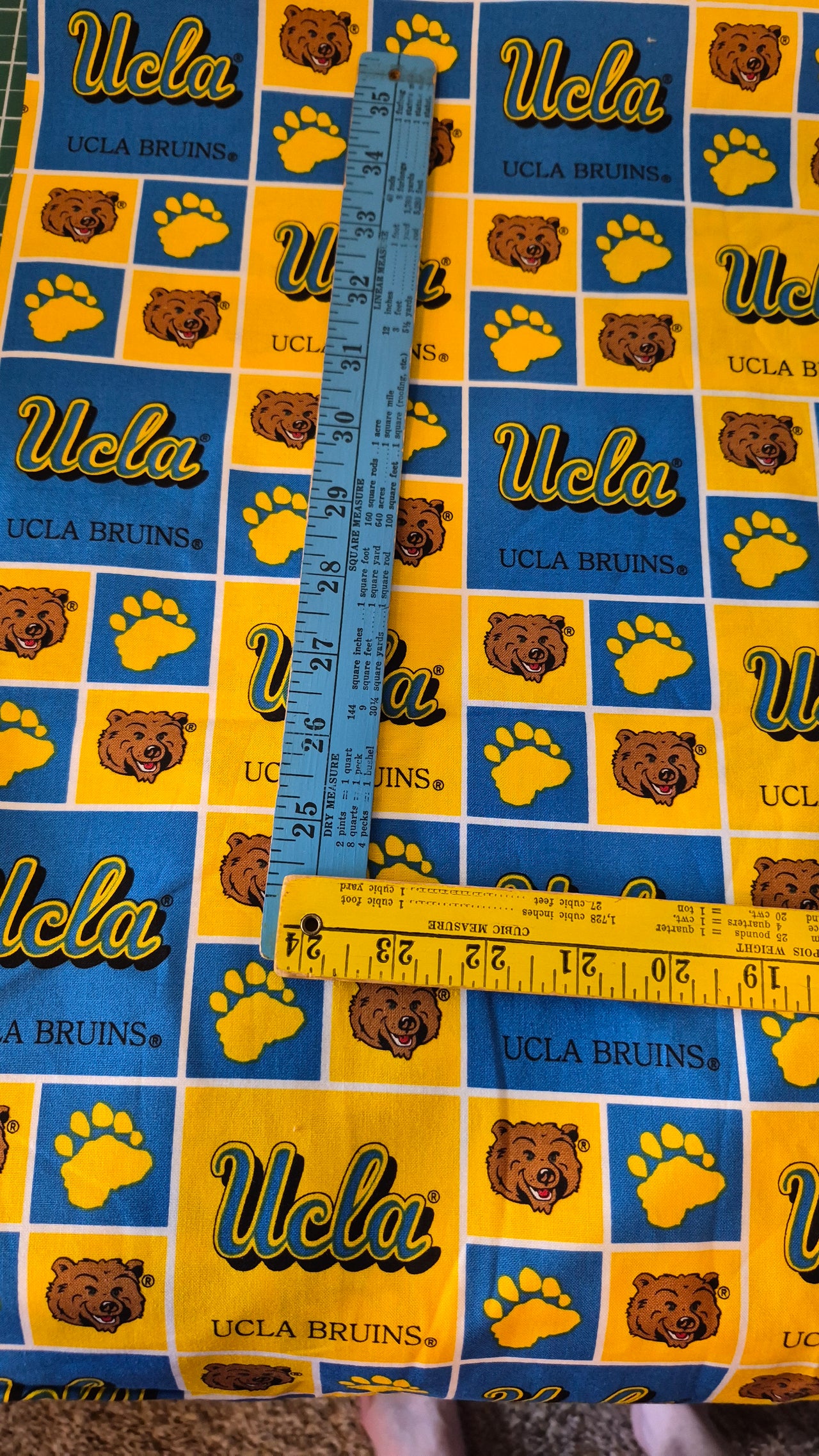 Share NCCA UCLA Bruins cotton licensed quilting fabric 1/2 yard x 44" w Bear & paw