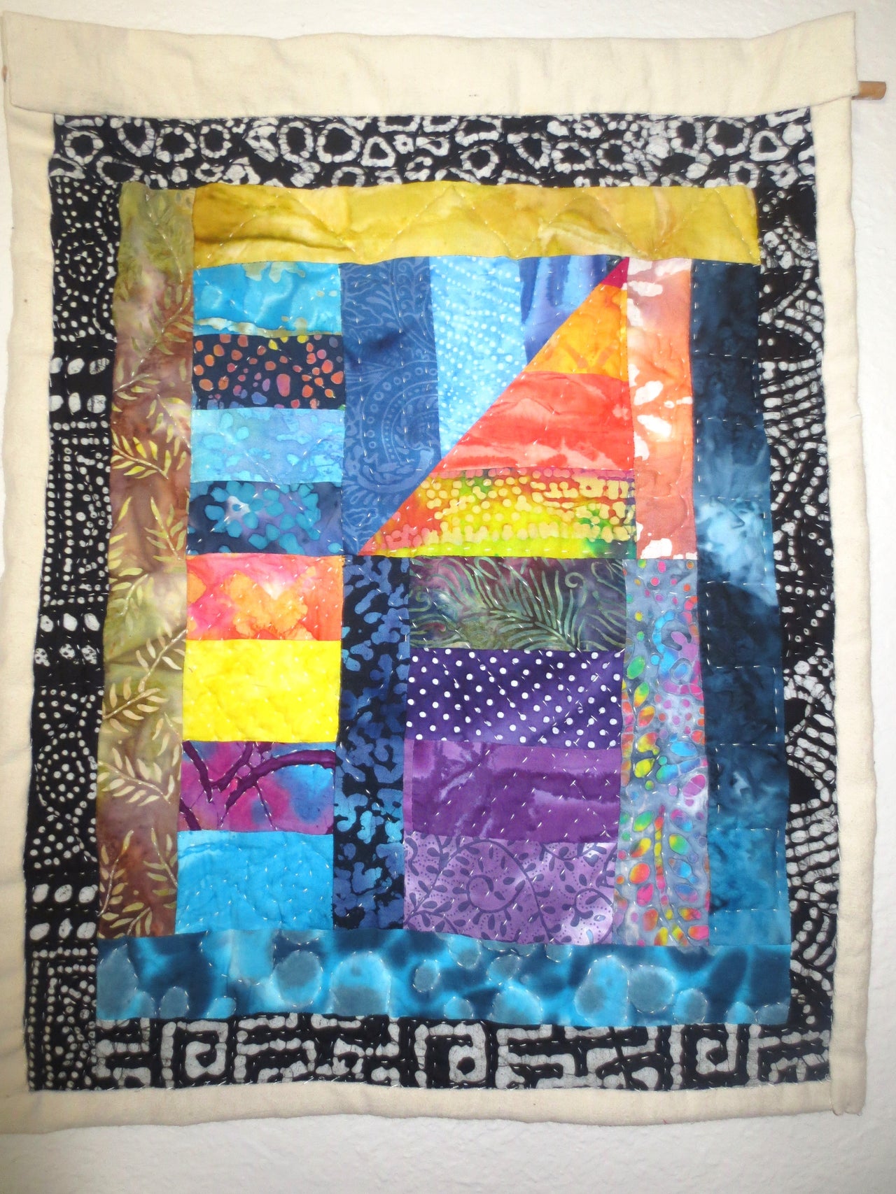 Vibrant Bohemian hand quilted batik wall hanging