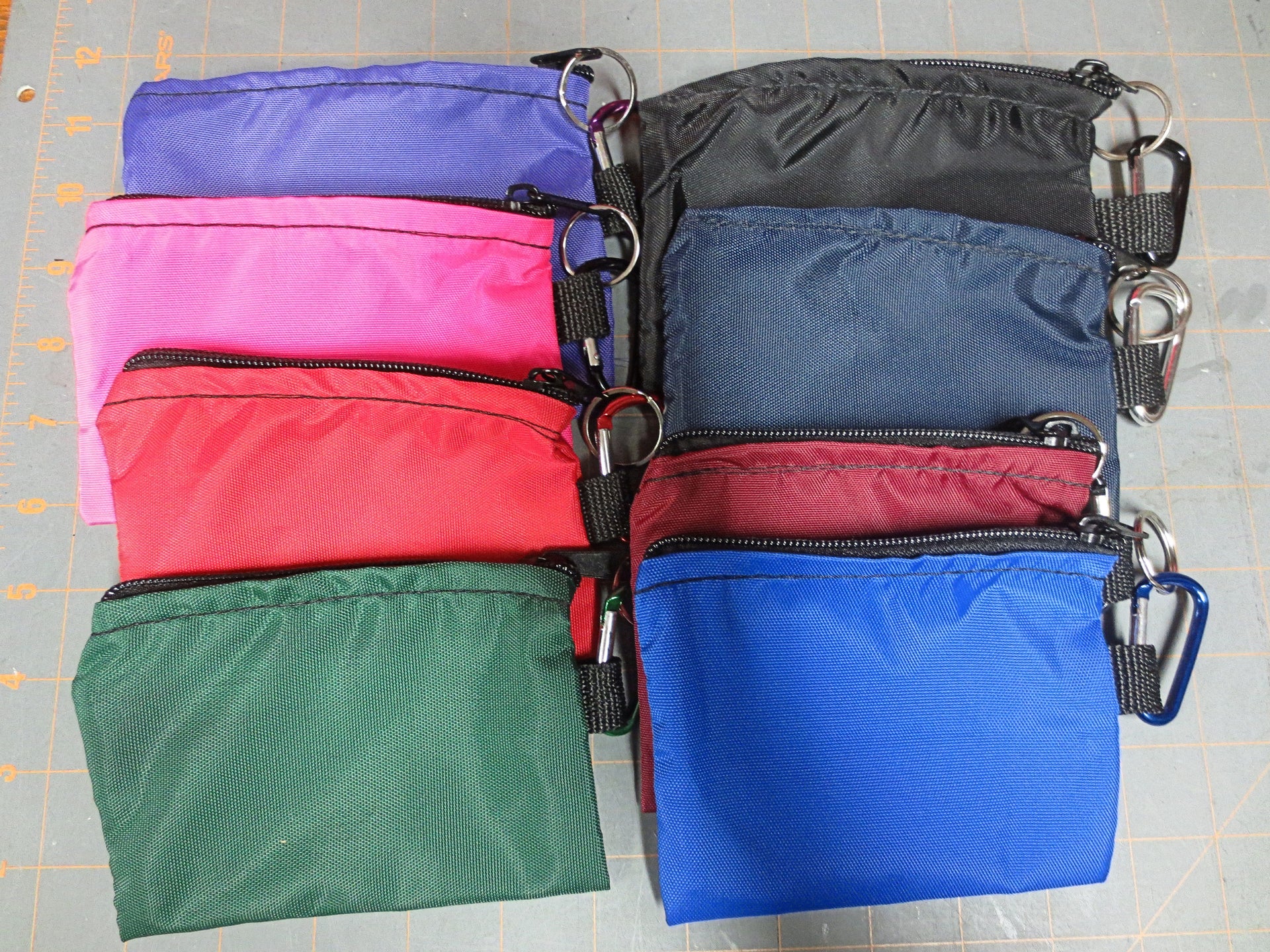 zippered pouches in two sizes extra small and small with choice of color and options to add