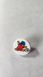 vintage paddington bear collectible metal and plastic buttons by eden playing soccer