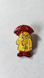 vintage paddington bear collectible metal and plastic buttons by eden holding umbrella