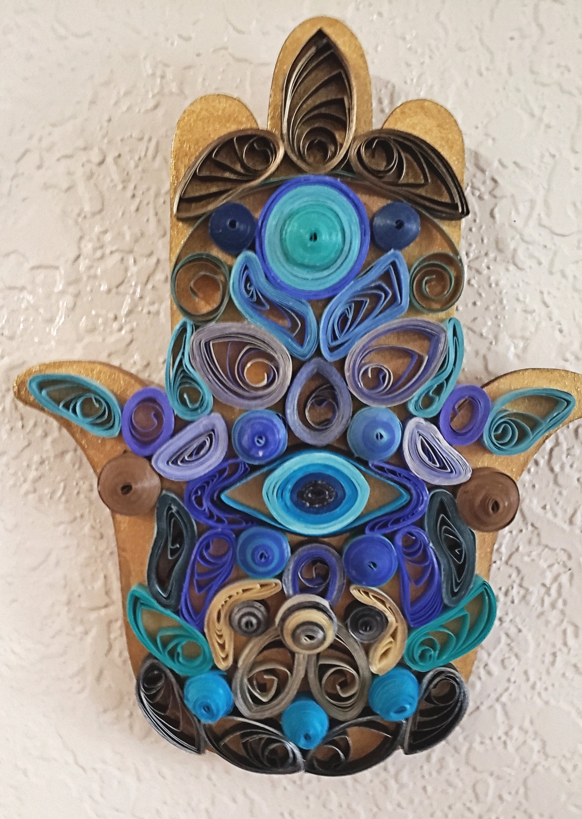 quilled hamsa wall art