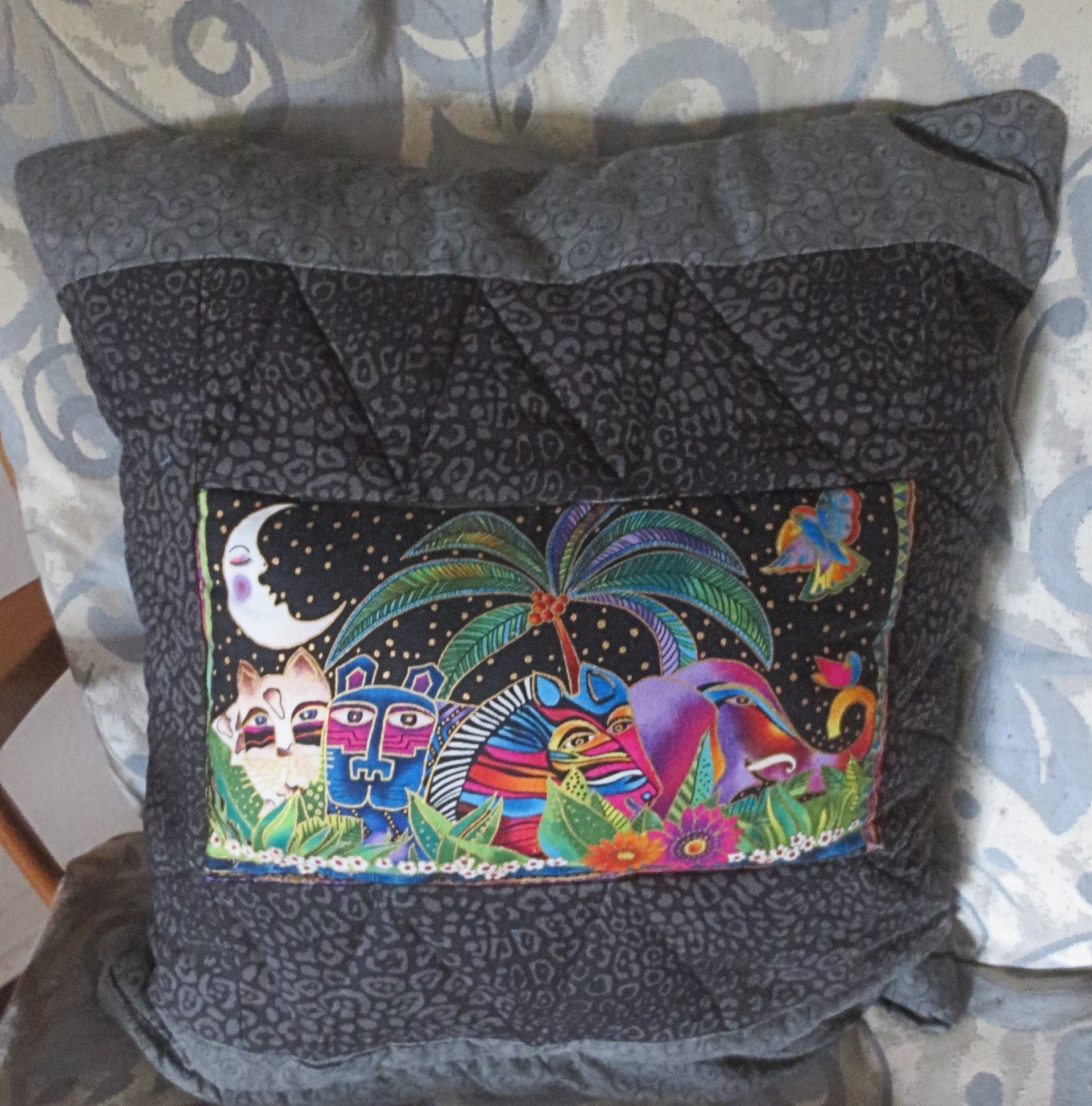 quilted jungle animals pillows black with multiple animals
