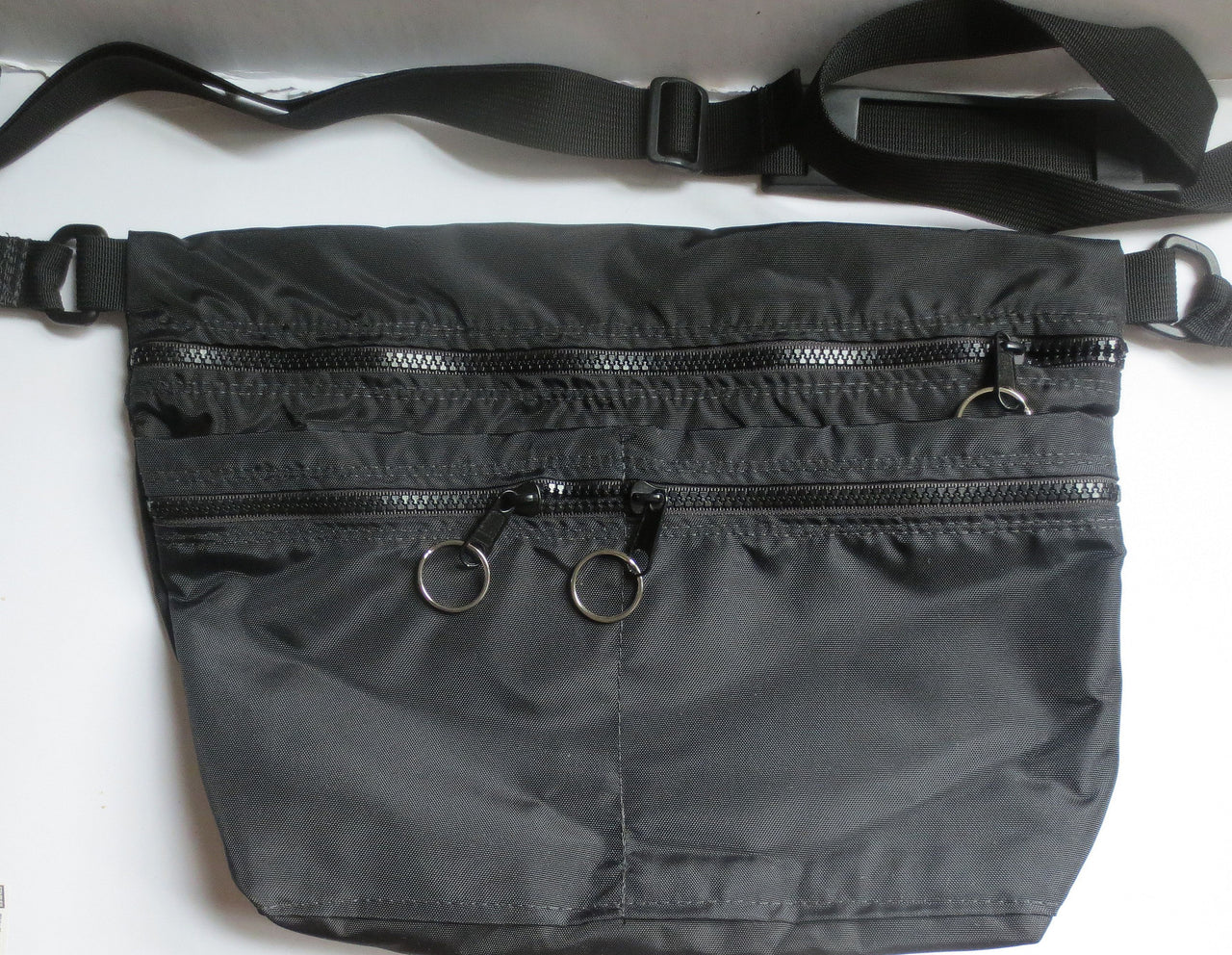sling to waist packs --- great as a purse/pocketbook, awesome for travel and on the go!