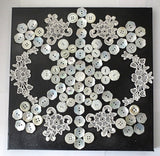 button art with vintage mother of pearl venise lace