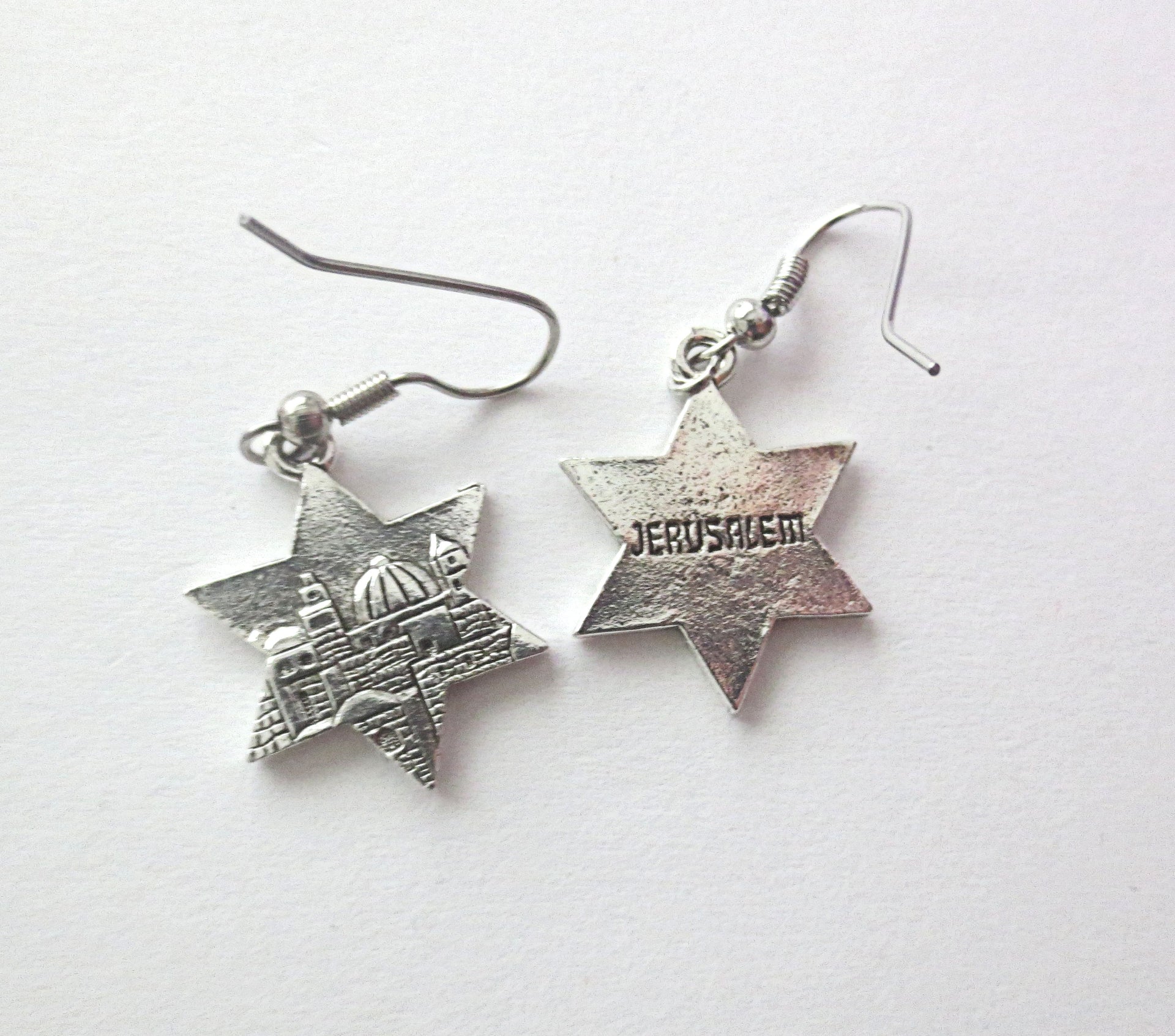 star of david silver charm earrings sterling silver ear wires one side jerusalem scene other side the word jerusalem / hypoallergic wires