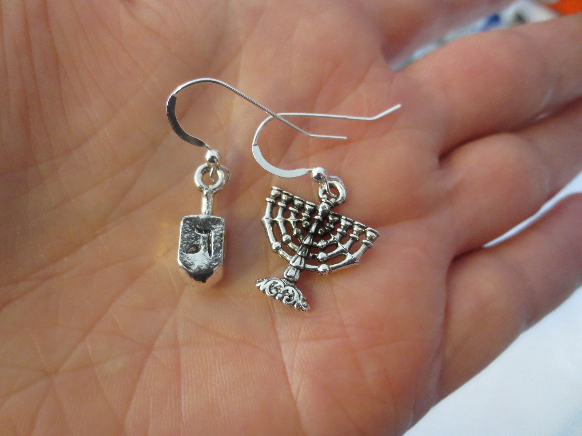 hanukkah or chanukah simple silver earrings menorahs and dreidels