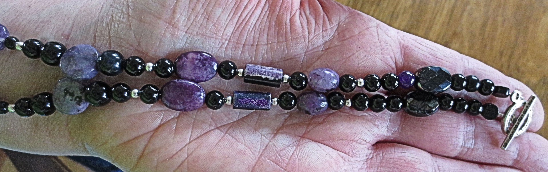 hamsa gemstone beaded purple black necklace