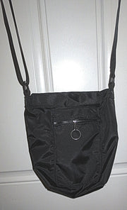 kate's sling pocketbook or purse full sling style  on closeout sale now while supplies last