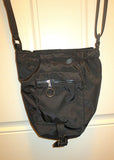 kate's sling pocketbook or purse full sling style  on closeout sale now while supplies last